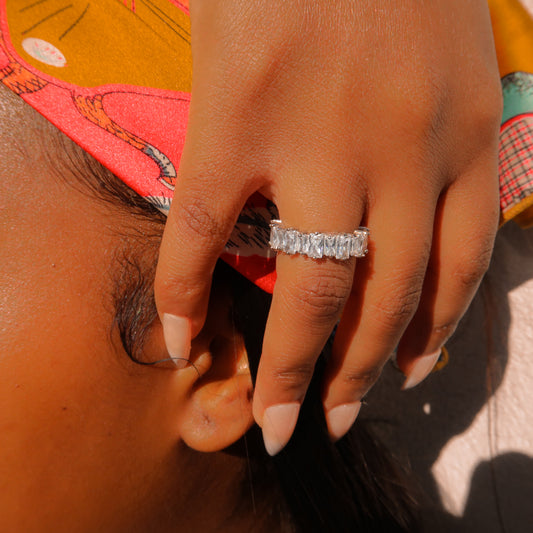 crushed crystal ring in silver modelled on finger